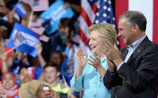 Democratic presidential candidate Hillary Clinton, left and vice presidential candidate Sen. Tim Kaine, D-Virginia, at a campaign rally at Florida International University Panther Arena on July 23, 2016 in Miami, Florida. (Gustavo Caballero/Getty Images/AFP)