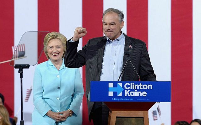 Democratic presidential candidate Hillary Clinton, left, and vice presidential candidate Sen. Tim Kaine (D-Virginia) at a campaign rally at Florida International University Panther Arena on July 23, 2016 in Miami, Florida. (Gustavo Caballero/Getty Images/AFP)