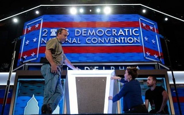 PHILADELPHIA, PA - JULY 24: Workers prepare the podium ahead of the Democratic National Convention at the Wells Fargo Center, July 24, 2016 in Philadelphia, Pennsylvania. (Drew Angerer/Getty Images/AFP) PHILADELPHIA, PA - JULY 24: Workers prepare the podium ahead of the Democratic National Convention at the Wells Fargo Center, July 24, 2016 in Philadelphia, Pennsylvania. (Drew Angerer/Getty Images/AFP)