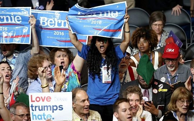 Delegates in support of Sen. Bernie Sanders (I-VT) cheer on the first day of the Democratic National Convention at the Wells Fargo Center, July 25, 2016 in Philadelphia, Pennsylvania. (Win McNamee/Getty Images/AFP) Delegates in support of Sen. Bernie Sanders (I-VT) cheer on the first day of the Democratic National Convention at the Wells Fargo Center, July 25, 2016 in Philadelphia, Pennsylvania. (Win McNamee/Getty Images/AFP)