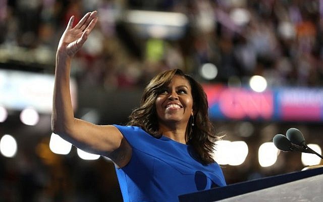 First lady Michelle Obama acknowledges the crowd after delivering remarks on the first day of the Democratic National Convention at the Wells Fargo Center, July 25, 2016 in Philadelphia, Pennsylvania. (Joe Raedle/Getty Images/AFP) First lady Michelle Obama acknowledges the crowd after delivering remarks on the first day of the Democratic National Convention at the Wells Fargo Center, July 25, 2016 in Philadelphia, Pennsylvania. (Joe Raedle/Getty Images/AFP)