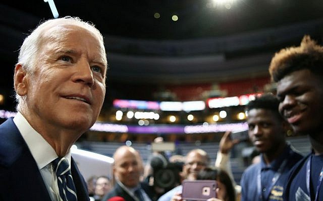 US Vice President Joe Biden talks to students from Eagle Academy for Young Men during a walk through before day two of the Democratic National Convention on July 26, 2016 in Philadelphia, Pennsylvania. (Jessica Kourkounis/Getty Images/AFP)