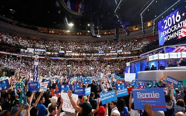 The crowd cheers after formally nominating Democratic presidential candidate Hillary Clinton on the second day of the Democratic National Convention at the Wells Fargo Center, July 26, 2016 in Philadelphia, Pennsylvania. (Aaron P. Bernstein/Getty Images/AFP)