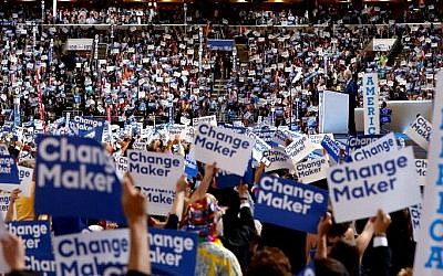 Delegates stand and cheer on the second day of the Democratic National Convention at the Wells Fargo Center, July 26, 2016 in Philadelphia, Pennsylvania. (Aaron P. Bernstein/Getty Images/AFP)