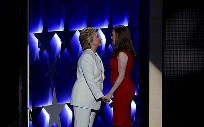 Democratic presidential nominee Hillary Clinton embraces her daughter Chelsea Clinton after being introduced on the fourth and final day of the Democratic National Convention at the Wells Fargo Center in Philadelphia, Pennsylvania on July 28, 2016. (Alex Wong/Getty Images/AFP)