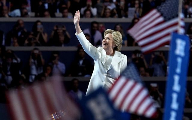 Democratic presidential candidate Hillary Clinton acknowledges the crowd as she arrives on stage during the fourth day of the Democratic National Convention at the Wells Fargo Center in Philadelphia, Pennsylvania, July 28, 2016. (Jessica Kourkounis/Getty Images/AFP)