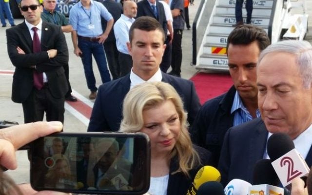 Benjamin Netanyahu and his wife Sara speaking to the press at Ben Gurion International Airport on July 4, 2016, at the start of a trip to Africa. (Raphael Ahren/Times of Israel) Benjamin Netanyahu and his wife Sara speaking to the press at Ben Gurion International Airport on July 4, 2016, at the start of a trip to Africa. (Raphael Ahren/Times of Israel)