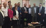 Former Saudi general Dr. Anwar Eshki (center, in striped tie) and other members of his delegation, meeting with Knesset members and others during a visit to Israel on July 22, 2016 (via Twitter)