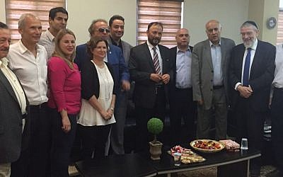 Former Saudi general Dr. Anwar Eshki (center, in striped tie) and other members of his delegation, meet with Israeli Knesset members and others during a visit to Israel on July 22, 2016. (via Twitter)