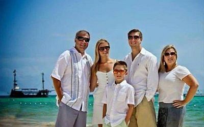 This photo provided by Jess Davis shows the Copeland family, from left, Sean, Maegan, Brodie, Austin and Kim. Davis, a family friend, said Sean Copeland and his son Brodie were killed Thursday, July 14, 2016 when a Frenchman of Tunisian descent drove a truck through crowds celebrating Bastille Day along Nice's beachfront, killing scores of people. (Courtesy of Jess Davis via AP)