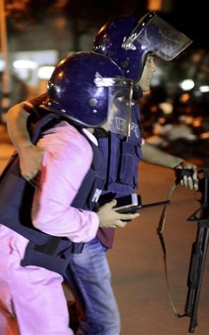 An unidentified security personnel is taken for medical attention after a group of gunmen attacked a restaurant popular with foreigners in a diplomatic zone of the Bangladeshi capital Dhaka, on Friday, July 1, 2016. (AP Photo) An unidentified security personnel is taken for medical attention after a group of gunmen attacked a restaurant popular with foreigners in a diplomatic zone of the Bangladeshi capital Dhaka, on Friday, July 1, 2016. (AP Photo)