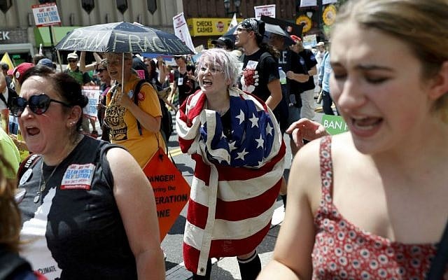 Protesters yell during a demonstration in downtown on Sunday, July 24, 2016, in Philadelphia. (AP Photo/John Minchillo) Protesters yell during a demonstration in downtown on Sunday, July 24, 2016, in Philadelphia. (AP Photo/John Minchillo)