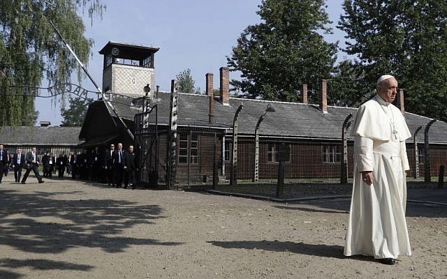 Pope Francis walks through the gate of the former Nazi German death camp of Auschwitz in Oswiecim, Poland, Friday, July 29, 2016. (AP/Gregorio Borgia) Pope Francis walks through the gate of the former Nazi German death camp of Auschwitz in Oswiecim, Poland, Friday, July 29, 2016. (AP/Gregorio Borgia)