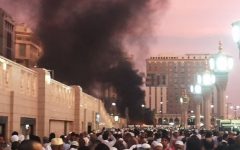 People stand by an explosion site in Medina, Saudi Arabia, Monday, July 4, 2016. (Courtesy of Noor Punasiya via AP)