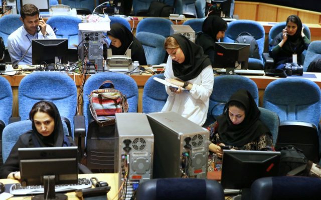 Iranian journalists follow the country's parliamentary runoff elections at the Interior Ministry in Tehran, Iran, Friday, April 29, 2016 (AP Photo/Ebrahim Noroozi) Iranian journalists follow the country's parliamentary runoff elections at the Interior Ministry in Tehran, Iran, Friday, April 29, 2016 (AP Photo/Ebrahim Noroozi)