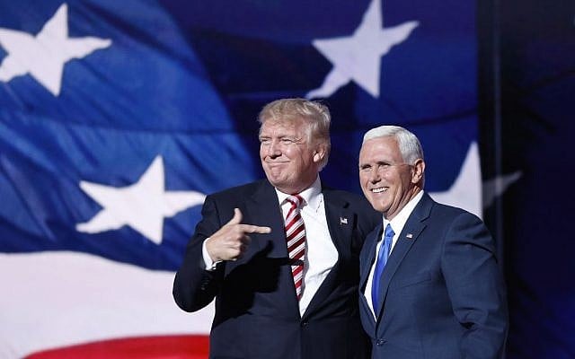 Republican presidential candidate Donald Trump points toward running mate Indiana Gov. Mike Pence after Pence's acceptance speech during the third day of the Republican National Convention in Cleveland, Ohio, Wednesday, July 20, 2016. (AP Photo/Mary Altaffer)