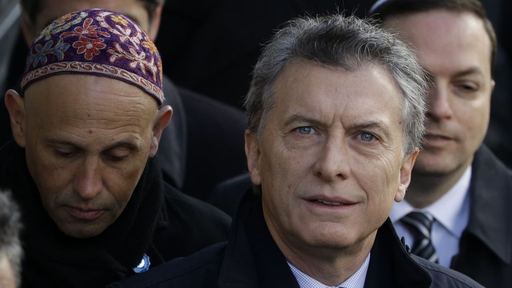 Argentine President Mauricio Macri arrives for the 22nd anniversary event for the AMIA Jewish center bombing that killed 85 people in Buenos Aires, Argentina, July 18, 2016. (AP Photo/Natacha Pisarenko) Argentine President Mauricio Macri arrives for the 22nd anniversary event for the AMIA Jewish center bombing that killed 85 people in Buenos Aires, Argentina, July 18, 2016. To his left is Sergio Bergman. (AP Photo/Natacha Pisarenko)
