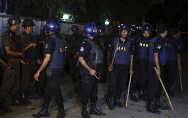 Bangladeshi security personnel cordon off the area after a group of gunmen attacked a restaurant popular with foreigners in a diplomatic zone of the Bangladeshi capital Dhaka, Bangladesh, Friday, July 1, 2016. (AP Photo) Bangladeshi security personnel cordon off the area after a group of gunmen attacked a restaurant popular with foreigners in a diplomatic zone of the Bangladeshi capital Dhaka, Bangladesh, Friday, July 1, 2016. (AP Photo)