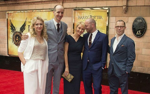 From left to right, producer Sonia Friedman, writers Jack Thorne, author J.K. Rowling, director John Tiffany and Sir Colin Callender, pose for photographers on arrival at the gala performance of Harry Potter and the Cursed Child, at the Palace Theatre in central London, Saturday, July 30, 2016. (Joel Ryan/Invision/AP)