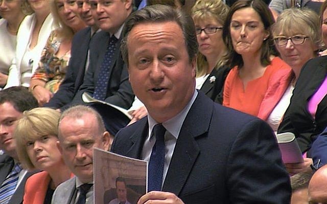 In this grab taken from video British Prime Minister David Cameron, center, displays a photo of himself and Larry the government's Chief Mouser to the Cabinet Office, during his final session of prime minister's questions at the House of Commons, in London, July 13 2016. (Parliamentary Recording Unit via Associated Press Video) In this grab taken from video British Prime Minister David Cameron, center, displays a photo of himself and Larry the government's Chief Mouser to the Cabinet Office, during his final session of prime minister's questions at the House of Commons, in London, July 13 2016. (Parliamentary Recording Unit via Associated Press Video)