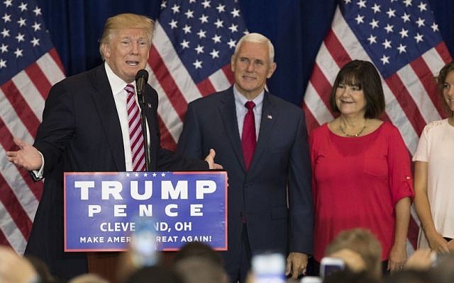 Republican presidential candidate Donald Trump speaks at a reception with friends and family following the Republican National Convention, Friday, July 22, 2016, in Cleveland. Listening are vice presidential running mate Gov. Mike Pence, R-Ind., Karen Pence, and Charlotte Pence. (AP Photo/Evan Vucci) Republican presidential candidate Donald Trump speaks at a reception with friends and family following the Republican National Convention, Friday, July 22, 2016, in Cleveland. Listening are vice presidential running mate Gov. Mike Pence, R-Ind., Karen Pence, and Charlotte Pence. (AP Photo/Evan Vucci)
