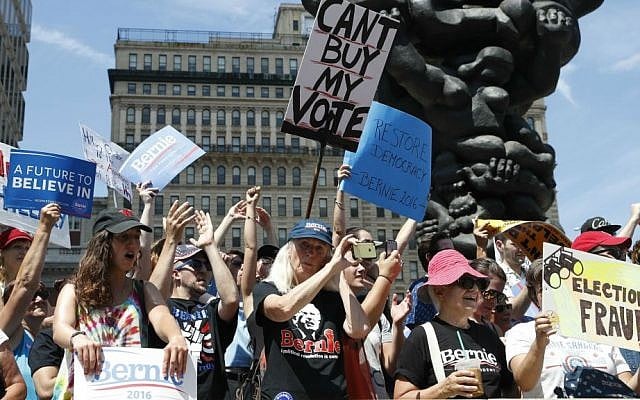 Supporters Bernie Sanders march during a protest in downtown Philadelphia on Sunday, July 24, 2016. (AP Photo/Alex Brandon) Supporters Bernie Sanders march during a protest in downtown Philadelphia on Sunday, July 24, 2016. (AP Photo/Alex Brandon)