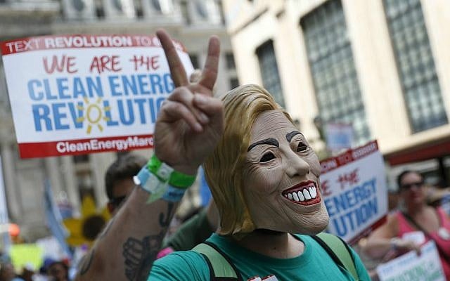 A supporter of Sen. Bernie Sanders, I-Vermont, marches during a protest in downtown on Sunday, July 24, 2016, in Philadelphia. (AP Photo/John Minchillo)