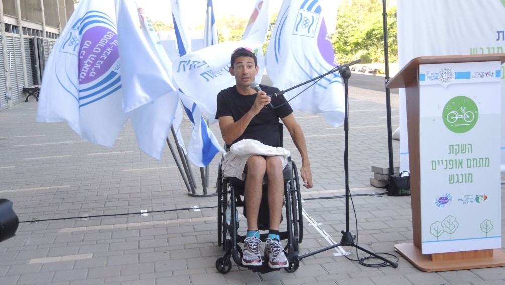 Koby Lion, 40, a silver medalist at the London 2012 Paralympics in the hand cycle time trial event, will also represent Israel at the Rio 2016 Paralympics in September. (Melanie Lidman/Times of Israel) Koby Lion, 40, a silver medalist at the London 2012 Paralympics in the hand cycle time trial event, at the dedication of the Accessible Cycling Complex in Tel Aviv on July 28, 2016. (Melanie Lidman/Times of Israel)