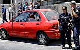 The scene where a baby boy was 'forgotten' in a car in Ashdod on May 30, 2016. The baby died of heat prostration, confirmed by paramedics at the scene. (Flash90)