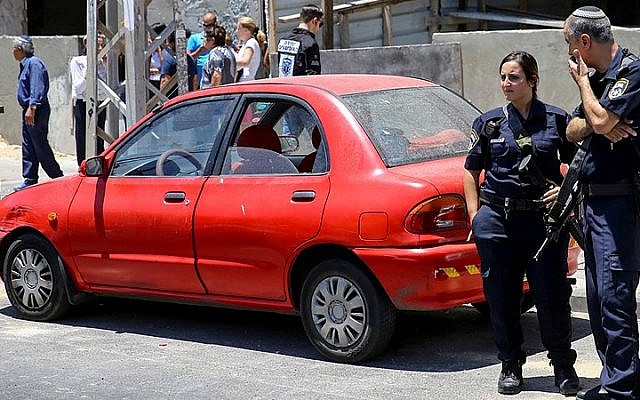 The scene where a baby boy was 'forgotten' in a car in Ashdod on May 30, 2016. The baby died of heat prostration, confirmed by paramedics at the scene. (Flash90) The scene where a baby boy was 'forgotten' in a car in Ashdod on May 30, 2016. The baby died of heat prostration, confirmed by paramedics at the scene. (Flash90)