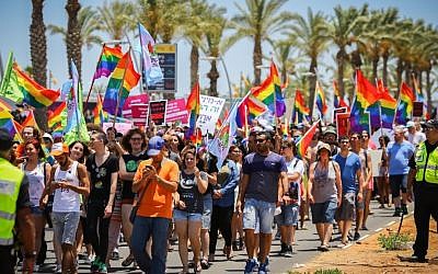 Hundreds of people attend the annual gay pride parade in the southern city of Ashdod on June 17, 2016. (Flash90)
