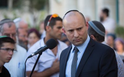 Education Minister Naftali Bennett delivers a eulogy at the funeral ceremony for Hallel Yaffa Ariel in the Jewish settlement of Kiryat Arba, in the West Bank, on June 30, 2016. (Yonatan Sindel/Flash90)