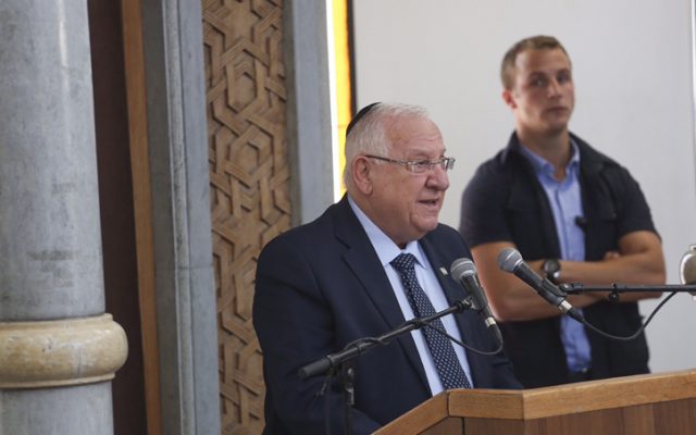President Reuven Rivlin speaks during the funeral service for Rabbi Miki Mark at the Otniel yeshiva on July 7, 2016. (Hadas Parush/Flash90)