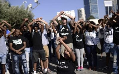 Family and friends of Yosef Salamsa protest for justice in Tel Aviv on July 3, 2016. (Tomer Neuberg/Flash90)