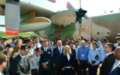 Benjamin Netanyahu and his wife Sara surrounded by IDF pilots and officers (blurred out), in Entebbe, Uganda, on July 4, 2016. (Kobi Gideon/GPO)