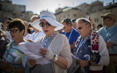 Members of the Reform and Conservative Jewish movements hold a mixed men and women prayer at the public square in front of the Western Wall, in Jerusalem's Old City, on July 4, 2016. (Yonatan Sindel/Flash90)