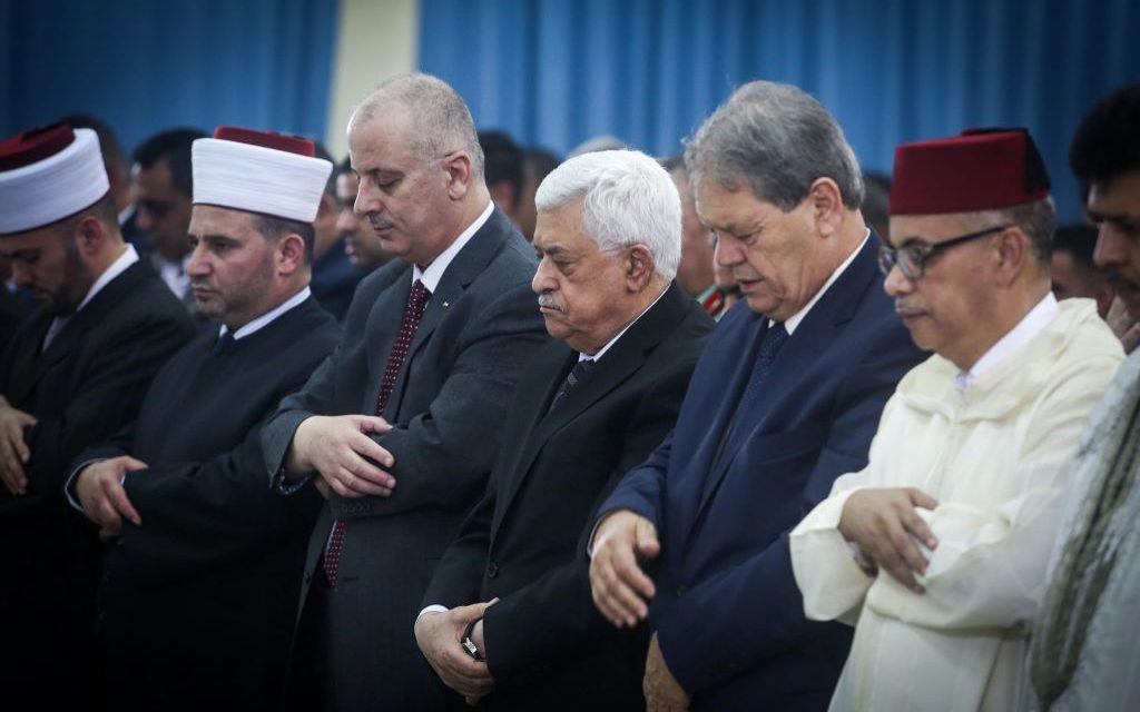 Mahmoud Abbas, center, at Eid al Fitr prayers in Ramallah on July 6, 2016. (Flash90)