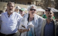 Members of the Reform and Conservative Jewish movements hold a mixed men and women prayer at the public square in front of the Western Wall, in Jerusalem's Old City, on July 7, 2016.(Hadas Parush/Flash90)