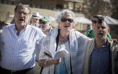Members of the Reform and Conservative Jewish movements hold a mixed men and women prayer at the public square in front of the Western Wall, in Jerusalem's Old City, on July 7, 2016.(Hadas Parush/Flash90)