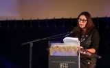 Culture Minister Miri Regev speaks to a crowd at the Jerusalem Film Festival on July 8, 2016, and receives boos in return (Miriam Alster/Flash 90)