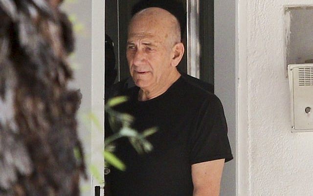 Former prime minister Ehud Olmert is seen departing Maasiyahu Prison in Ramle on July 11, 2016, for his first leave from prison since he began his 19-month sentence in February. (Avi Dishi/Flash90) Former prime minister Ehud Olmert is seen departing Maasiyahu Prison in Ramle on July 11, 2016, for his first leave from prison since he began his 19-month sentence in February. (Avi Dishi/Flash90)