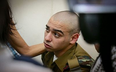 Sgt. Elor Azaria, the IDF soldier who shot an incapacitated Palestinian terrorist in Hebron, seen at the military court in Jaffa, July 24, 2016. (Flash90)