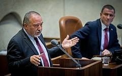 Defense Minister Avigdor Liberman addresses the Knesset plenum on July 25, 2016. (Yonatan Sindel/Flash90)