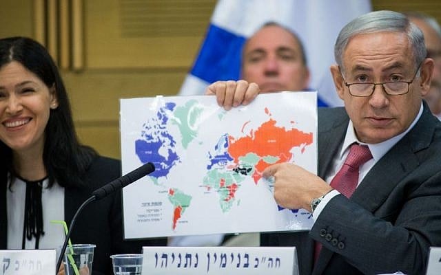 Prime Minister Benjamin Netanyahu shows his map of Israel's world relations, at a session of the Knesset State Control Committee, on July 25, 2016. To his side is committee chair Karin Elharar of Yesh Atid. (Yonatan Sindel/Flash90) Prime Minister Benjamin Netanyahu shows his map of Israel's world relations, at a session of the Knesset State Control Committee, on July 25, 2016. To his side is committee chair Karin Elharar of Yesh Atid. (Yonatan Sindel/Flash90)