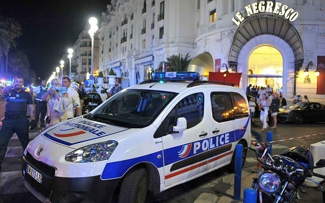 A police car is parked near the scene of a terror attack after a truck drove on to the sidewalk and plowed through a crowd of revelers who'd gathered to watch the fireworks in the French resort city of Nice, southern France, Friday, July 15, 2016. (AP Photo/Christian Alminana) A police car is parked near the scene of a terror attack after a truck drove on to the sidewalk and plowed through a crowd of revelers who'd gathered to watch the fireworks in the French resort city of Nice, southern France, Friday, July 15, 2016. (AP Photo/Christian Alminana)