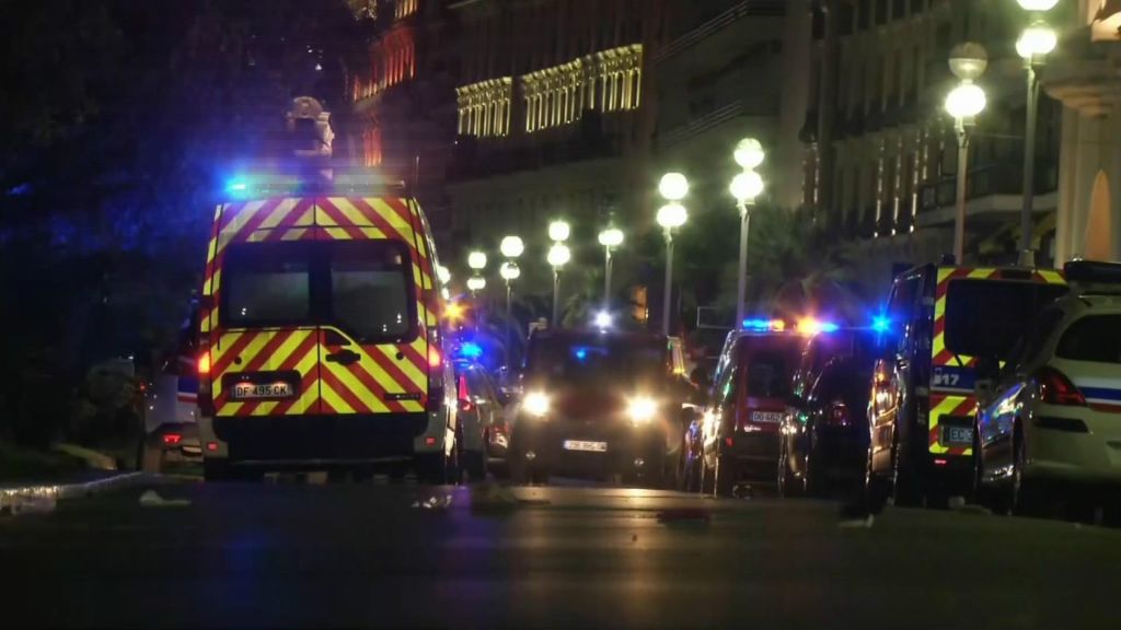 In this video grab taken Thursday July 14, 2016, ambulances and police cars are seen after a truck drove on to the sidewalk and plowed through a crowd of revelers who’d gathered to watch the fireworks in the French resort city of Nice. (BFMTV via AP) In this video grab taken Thursday July 14, 2016, ambulances and police cars are seen after a truck drove on to the sidewalk and plowed through a crowd of revelers who’d gathered to watch the fireworks in the French resort city of Nice. (BFMTV via AP)