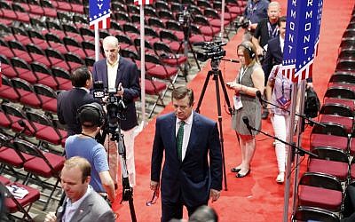 Trump Campaign Chairman Paul Manafort walks off the floor of the Republican National Convention, July 17, 2016, in Cleveland. (AP Photo/Carolyn Kaster) Trump Campaign Chairman Paul Manafort walks off the floor of the Republican National Convention, July 17, 2016, in Cleveland. (AP Photo/Carolyn Kaster)