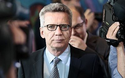 German Interior Minister Thomas de Maiziere arrives for the cabinet meeting at the chancellery in Berlin, Germany, Wednesday, July 20, 2016. (AP Photo/Markus Schreiber) German Interior Minister Thomas de Maiziere arrives for the cabinet meeting at the chancellery in Berlin, Germany, Wednesday, July 20, 2016. (AP Photo/Markus Schreiber)