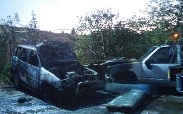Vehicles torched by suspected Jewish terrorists in the northern Arab village of Yafia on June 10, 2016. (Israel Police) Vehicles torched by suspected Jewish terrorists in the northern Arab village of Yafia on June 10, 2016. (Israel Police)