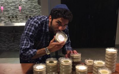 Ohad Fisherman shows how delicious his Hummus Joonam is. (Courtesy)